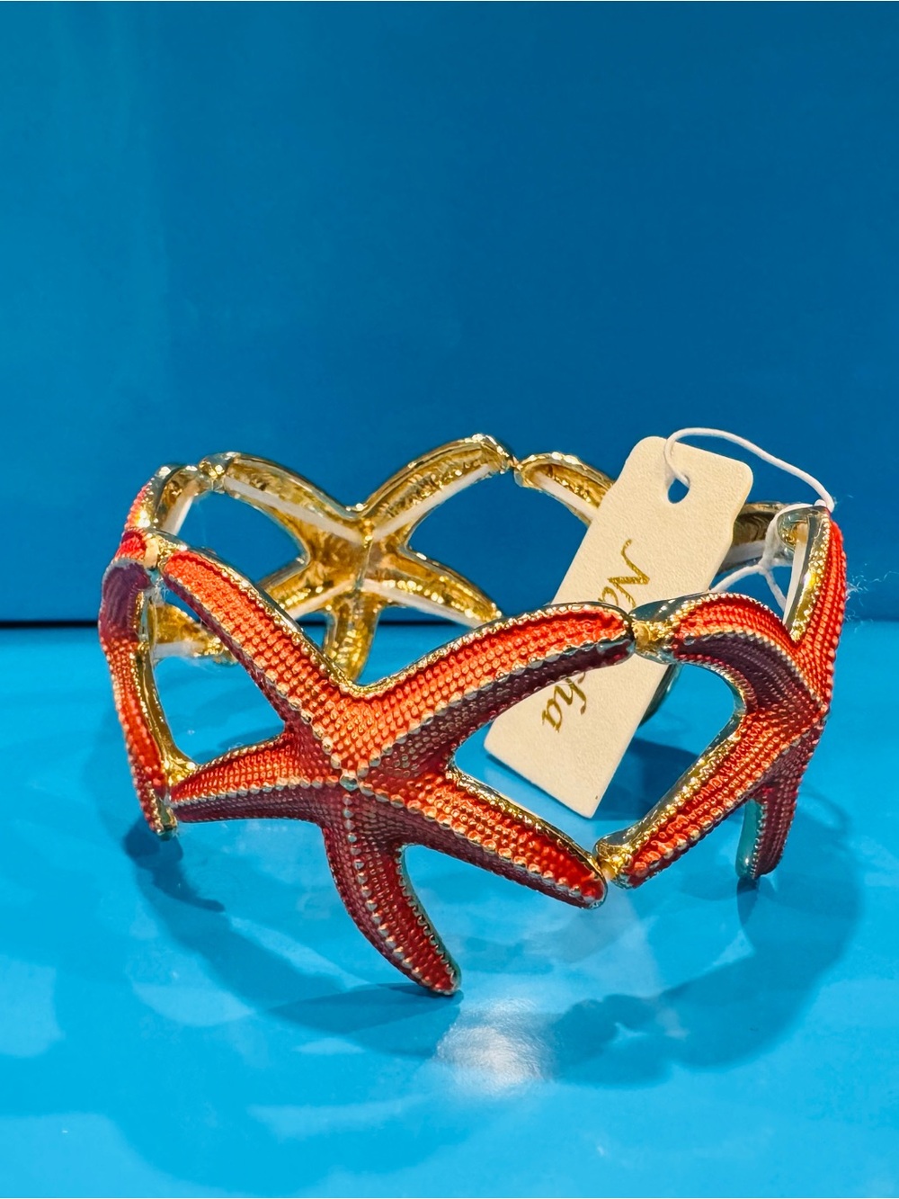NWT Natasha Couture Coral and Gold Starfish Cuff Bracelet